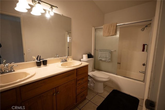 13117 Pan Am Blvd, Moreno Valley, CA 92553 - bathroom featuring tile patterned flooring, toilet, double vanity, and enclosed tub / shower combo