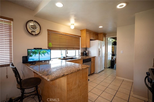 13117 Pan Am Blvd, Moreno Valley, CA 92553 - kitchen with a sink, dishwasher, a peninsula, white fridge with ice dispenser, and light tile patterned flooring