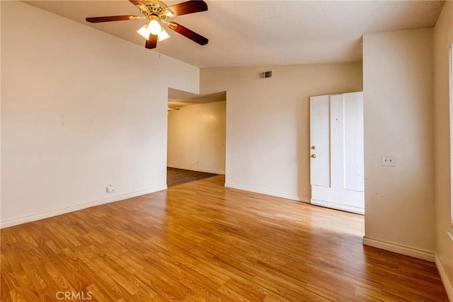 23719 White Owl Ct, Moreno Valley, CA 92553 - spare room with lofted ceiling, wood finished floors, ceiling fan, and baseboards