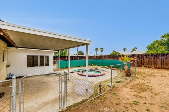 23719 White Owl Ct, Moreno Valley, CA 92553 - view of pool featuring a fenced backyard and a gate
