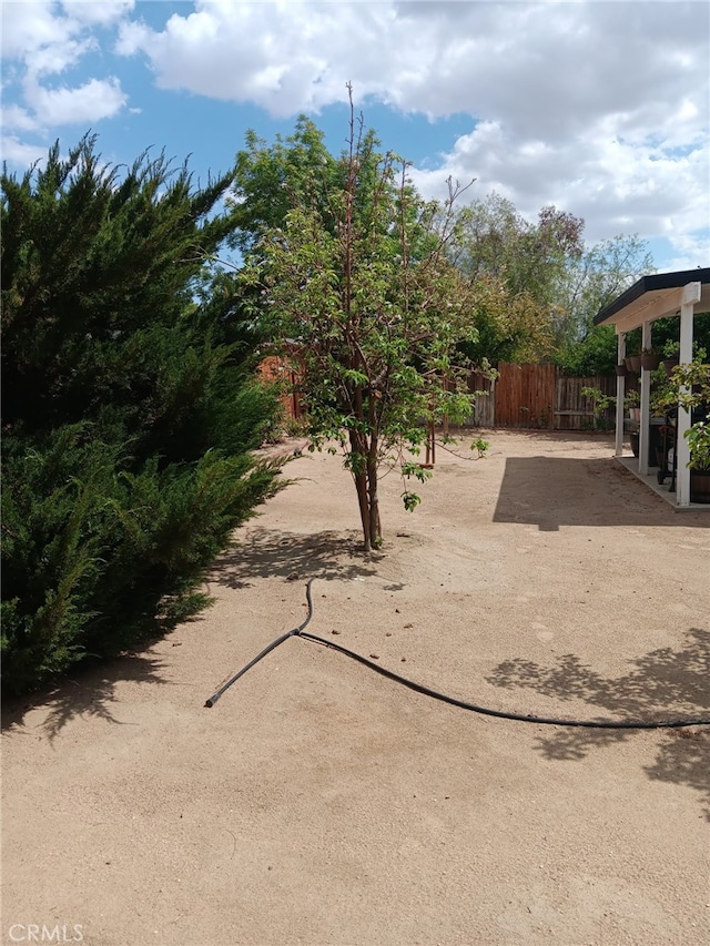 17795 Stevens Rd, Adelanto, CA 92301 - view of yard featuring fence and a patio