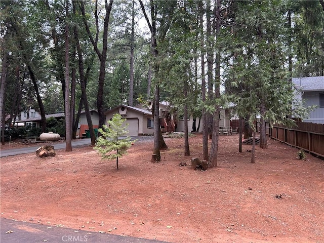 14749 Vassar Ct, Magalia, CA 95954 - view of yard with fence and a garage