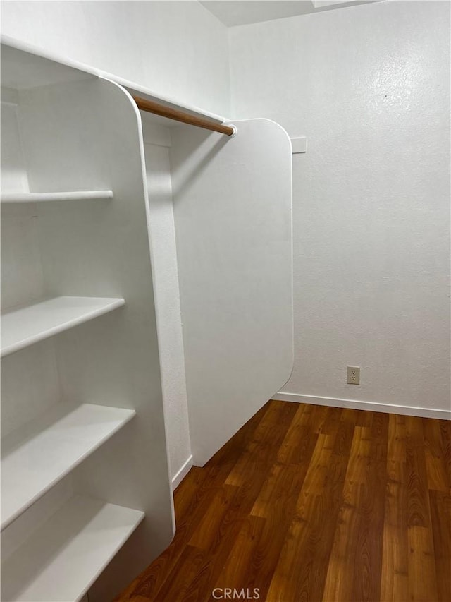 14749 Vassar Ct, Magalia, CA 95954 - walk in closet with wood finished floors
