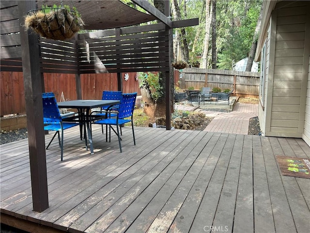 14749 Vassar Ct, Magalia, CA 95954 - deck featuring outdoor dining area and a fenced backyard