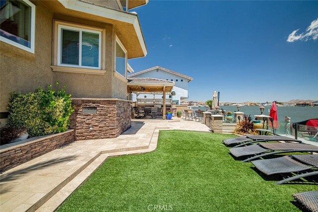 13545 Anchor Dr, Victorville, CA 92395 - view of grassy yard featuring a patio area