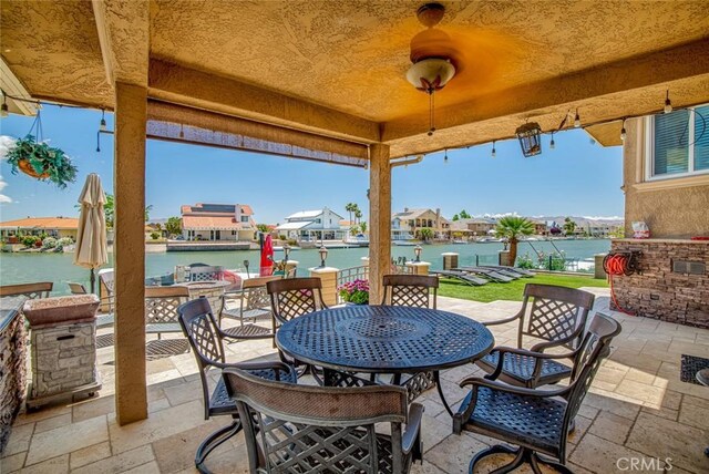 13545 Anchor Dr, Victorville, CA 92395 - view of patio / terrace featuring outdoor dining space and a water view