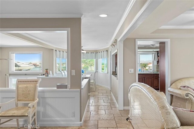 13545 Anchor Dr, Victorville, CA 92395 - interior space featuring stone tile flooring, ornamental molding, ceiling fan, recessed lighting, and baseboards