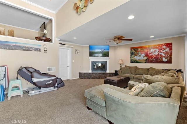 13545 Anchor Dr, Victorville, CA 92395 - carpeted living room with ornamental molding, ceiling fan, recessed lighting, a fireplace, and baseboards