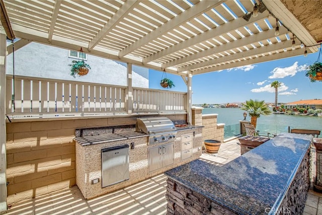 13545 Anchor Dr, Victorville, CA 92395 - view of patio / terrace featuring a water view, an outdoor fire pit, and a pergola