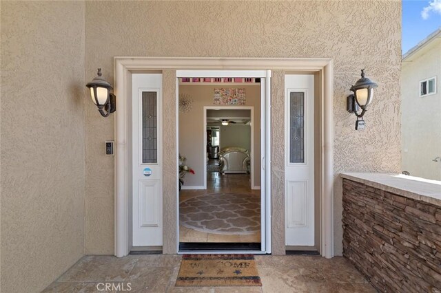 13545 Anchor Dr, Victorville, CA 92395 - doorway to property with stucco siding