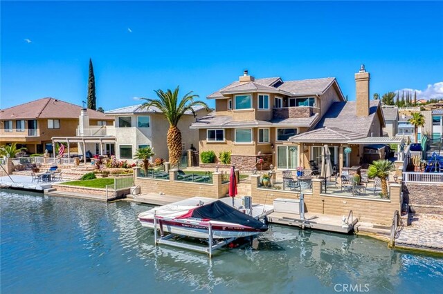 13545 Anchor Dr, Victorville, CA 92395 - dock area with a patio, a water view, and a residential view
