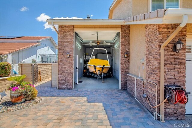 13545 Anchor Dr, Victorville, CA 92395 - view of exterior entry with a garage