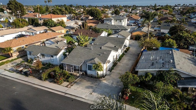 aerial view of property's location with nearby suburban area