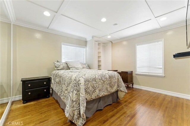 1933 W 147th St, Gardena, CA 90249 - bedroom featuring baseboards, wood finished floors, recessed lighting, crown molding, and coffered ceiling