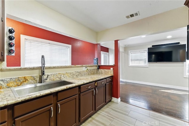 1933 W 147th St, Gardena, CA 90249 - kitchen with a sink and baseboards