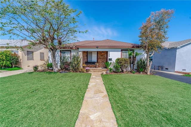 1933 W 147th St, Gardena, CA 90249 - view of front of property featuring a front lawn, stucco siding, and driveway