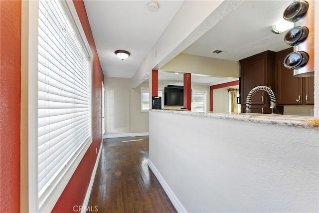 1933 W 147th St, Gardena, CA 90249 - hallway with baseboards and dark wood-style flooring