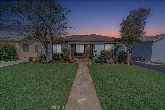 1933 W 147th St, Gardena, CA 90249 - ranch-style home with a yard and stucco siding