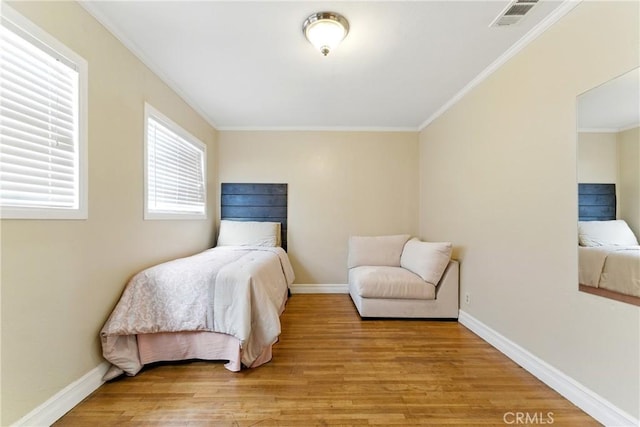 1933 W 147th St, Gardena, CA 90249 - bedroom featuring light wood-style flooring, crown molding, and baseboards
