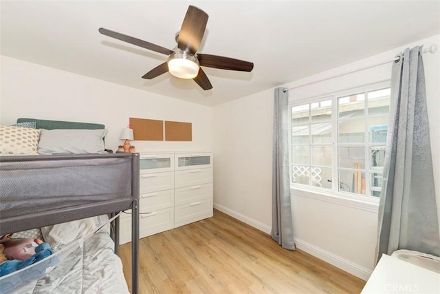 1417 E Abbottson St, Carson, CA 90746 - bedroom with light wood-style floors, baseboards, and a ceiling fan