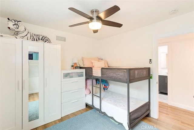 1417 E Abbottson St, Carson, CA 90746 - bedroom featuring light wood-style floors, baseboards, and ceiling fan