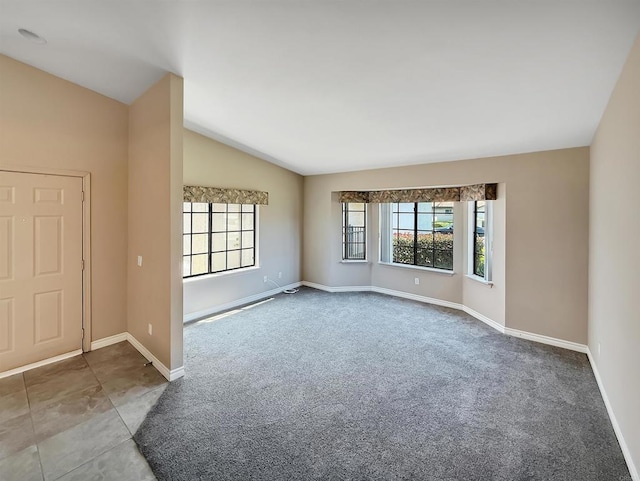 1074 Merrill Cir, Hemet, CA 92545 - carpeted spare room with vaulted ceiling and baseboards