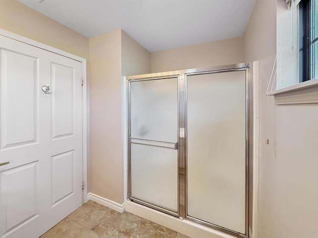 1074 Merrill Cir, Hemet, CA 92545 - bathroom featuring a shower stall and baseboards