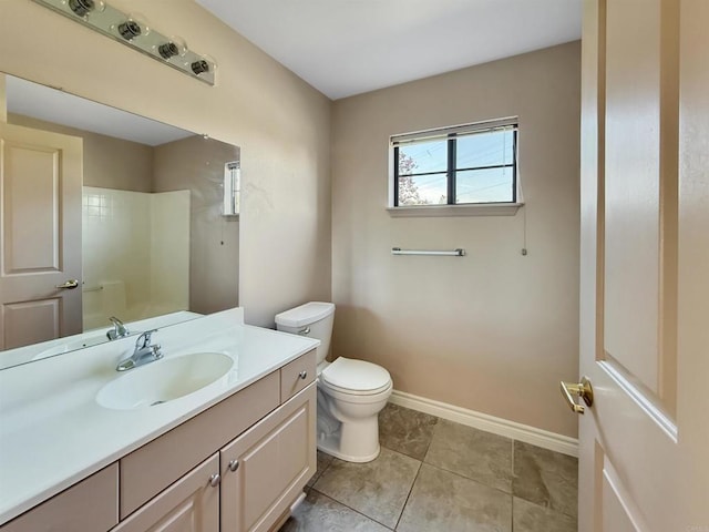 1074 Merrill Cir, Hemet, CA 92545 - bathroom featuring toilet, vanity, baseboards, and tile patterned flooring