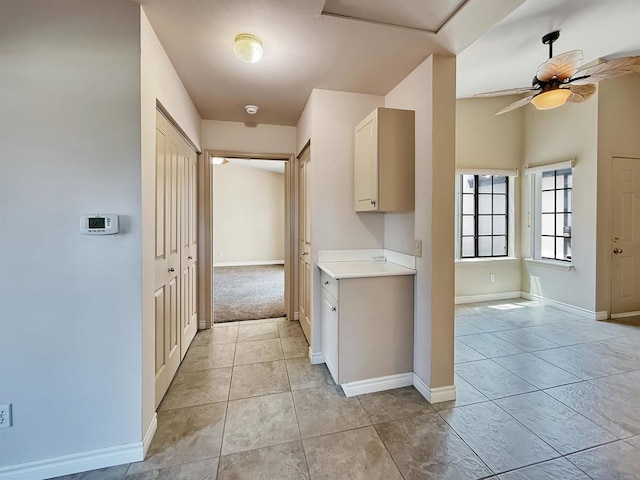 1074 Merrill Cir, Hemet, CA 92545 - kitchen featuring a ceiling fan, light countertops, and baseboards
