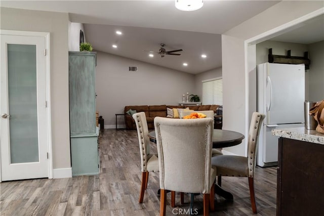 6338 Countryside Ct, Orland, CA 95963 - dining area with wood finished floors, a ceiling fan, baseboards, vaulted ceiling, and recessed lighting