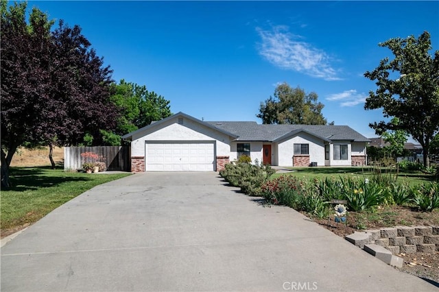 6338 Countryside Ct, Orland, CA 95963 - single story home with an attached garage, driveway, and brick siding
