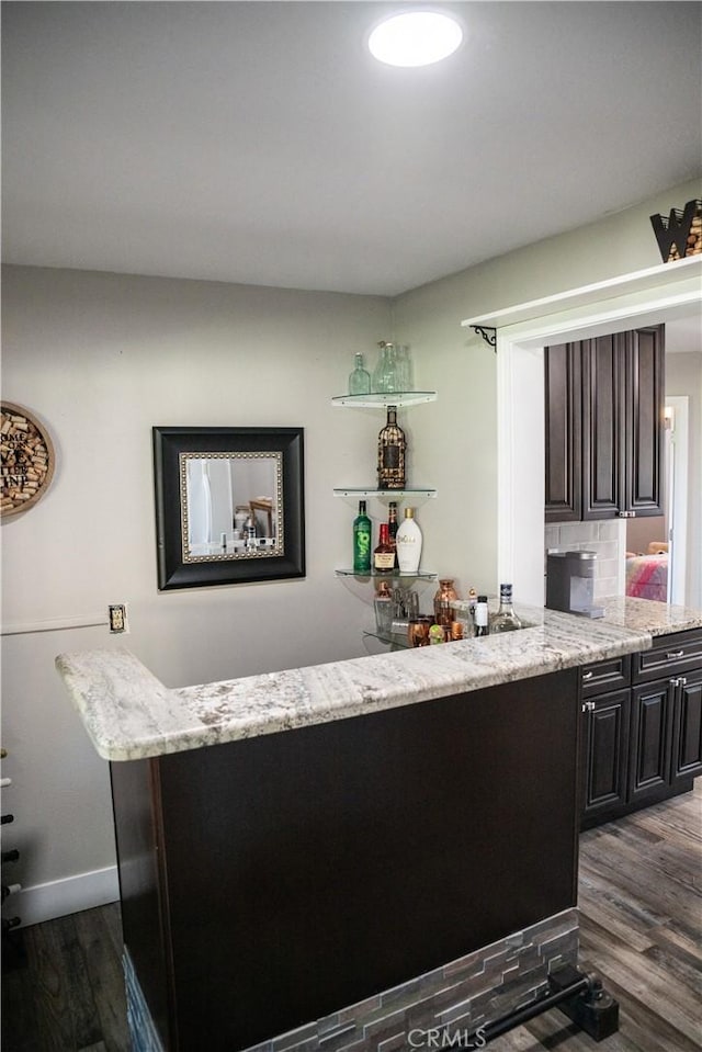 6338 Countryside Ct, Orland, CA 95963 - bar featuring dark wood-type flooring and baseboards
