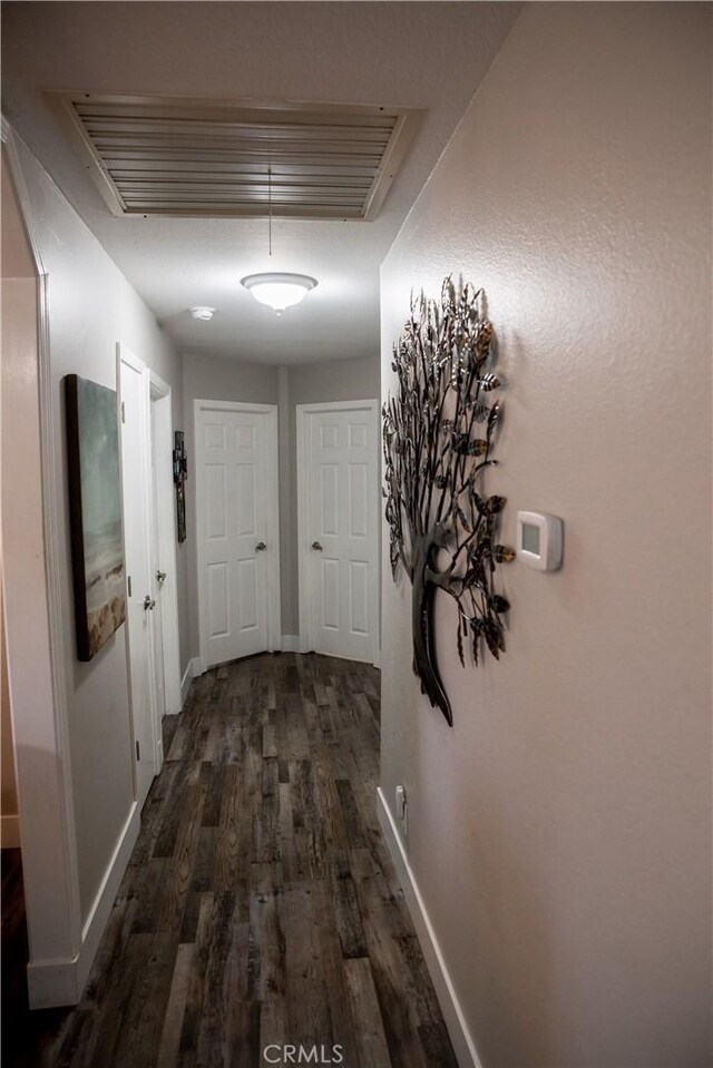 6338 Countryside Ct, Orland, CA 95963 - hallway with dark wood finished floors and baseboards
