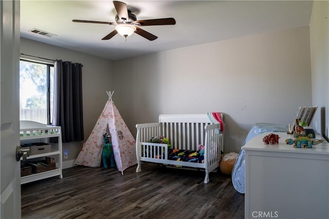 6338 Countryside Ct, Orland, CA 95963 - bedroom with wood finished floors, a ceiling fan, and a nursery area