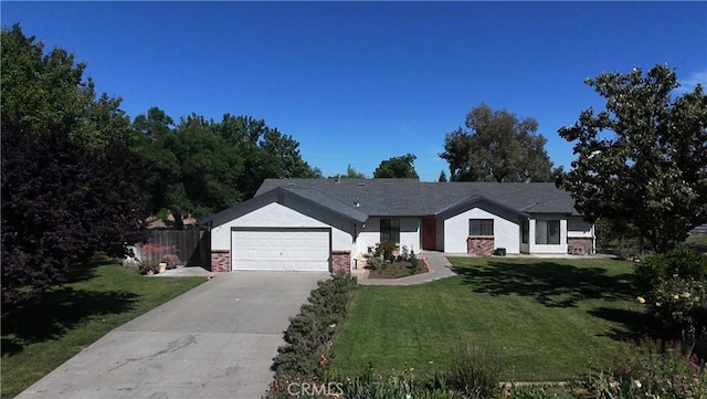 6338 Countryside Ct, Orland, CA 95963 - single story home featuring a garage, driveway, and brick siding