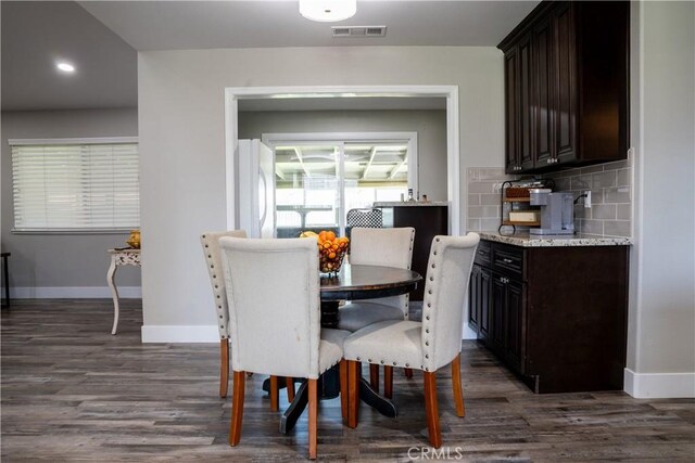 6338 Countryside Ct, Orland, CA 95963 - dining area featuring dark wood-type flooring, baseboards, and recessed lighting