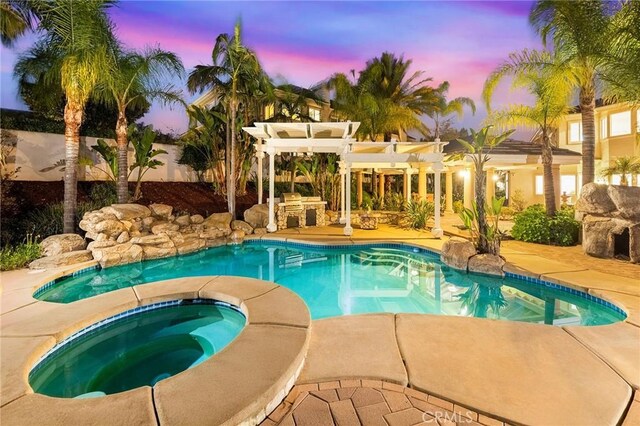 2638 Highridge Dr, Chino Hills, CA 91709 - outdoor pool featuring an in-ground hot tub, a patio area, a pergola, and exterior kitchen