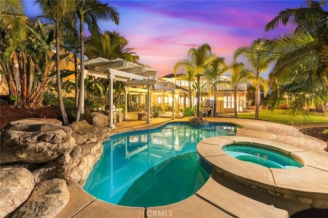 2638 Highridge Dr, Chino Hills, CA 91709 - pool at dusk with an in-ground hot tub, a pergola, an outdoor pool, and a patio