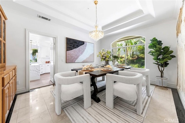 2638 Highridge Dr, Chino Hills, CA 91709 - dining space with a chandelier, crown molding, a tray ceiling, and baseboards