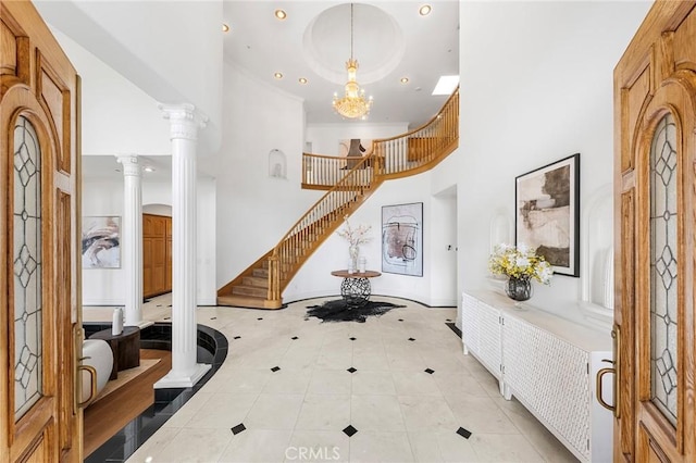 2638 Highridge Dr, Chino Hills, CA 91709 - foyer entrance with a towering ceiling, stairs, light tile patterned flooring, ornate columns, and recessed lighting
