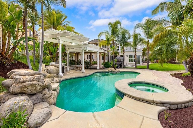 2638 Highridge Dr, Chino Hills, CA 91709 - swimming pool with a pergola, an in-ground hot tub, and a patio