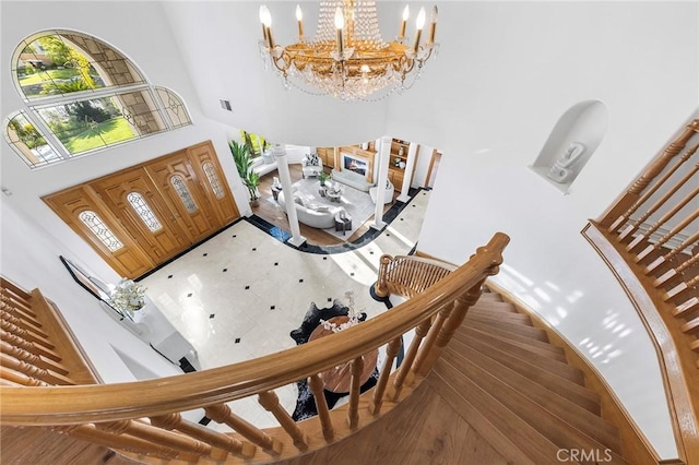 2638 Highridge Dr, Chino Hills, CA 91709 - foyer featuring a towering ceiling, a chandelier, and stairs
