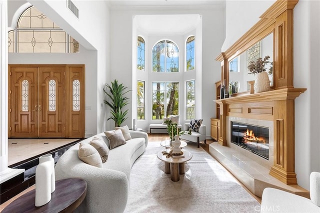 2638 Highridge Dr, Chino Hills, CA 91709 - entrance foyer with a towering ceiling, a premium fireplace, and ornamental molding