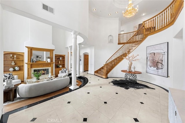 2638 Highridge Dr, Chino Hills, CA 91709 - tiled foyer entrance with a towering ceiling, stairway, arched walkways, ornate columns, and recessed lighting