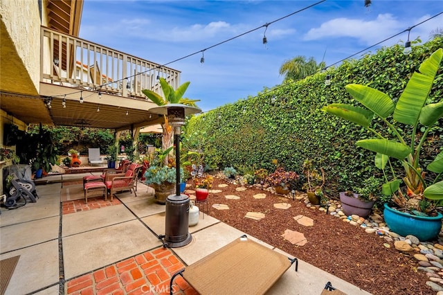 view of patio / terrace with a balcony