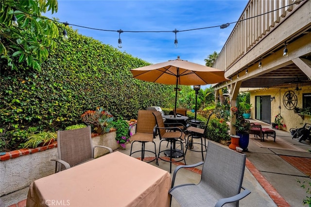view of patio with outdoor dining area
