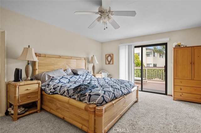 bedroom featuring light colored carpet, access to exterior, and a ceiling fan