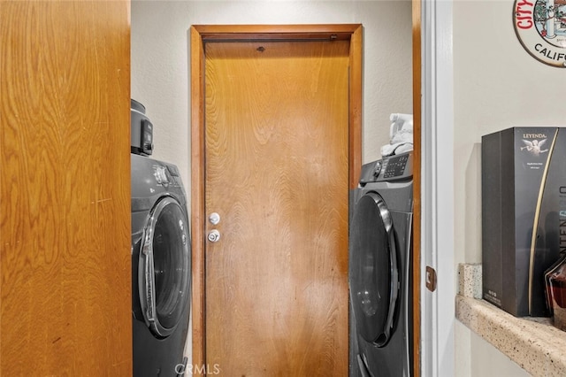 washroom featuring washer / dryer