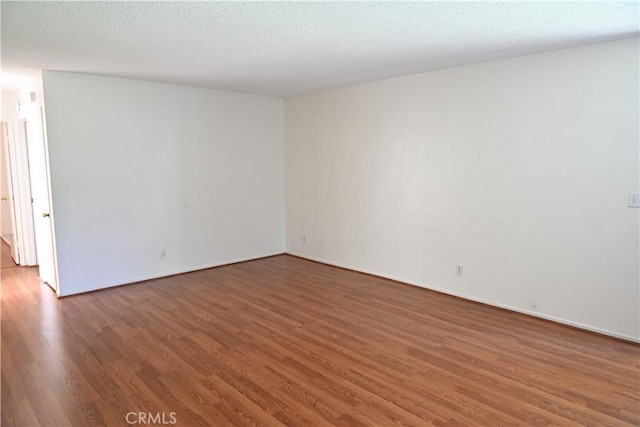 25258 Taylor St, Loma Linda, CA 92354 - spare room featuring wood finished floors and baseboards