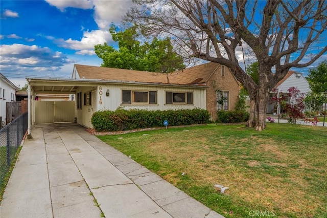 6016 Wilson Ave, South Gate, CA 90280 - single story home with driveway and a carport
